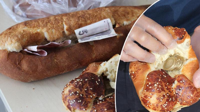 Dilencilere yapılan uygulamada, ekmek arasında para çıktı